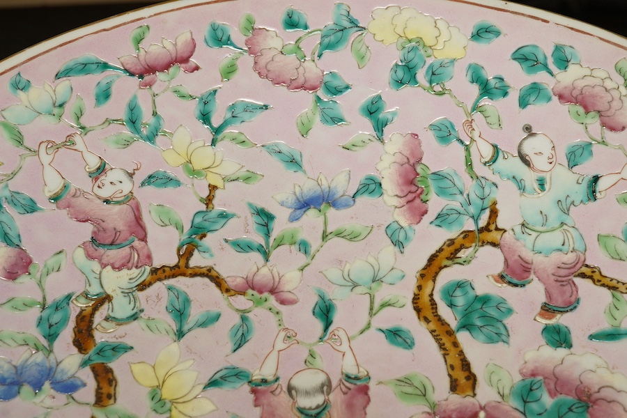 A Chinese enamelled porcelain pink ground ‘boys’ dish, mid 19th century